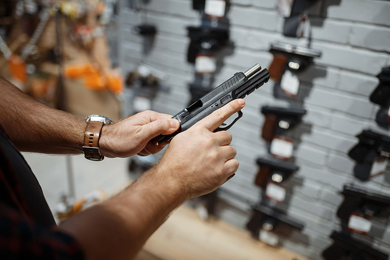 gun store handgun counter pistol
