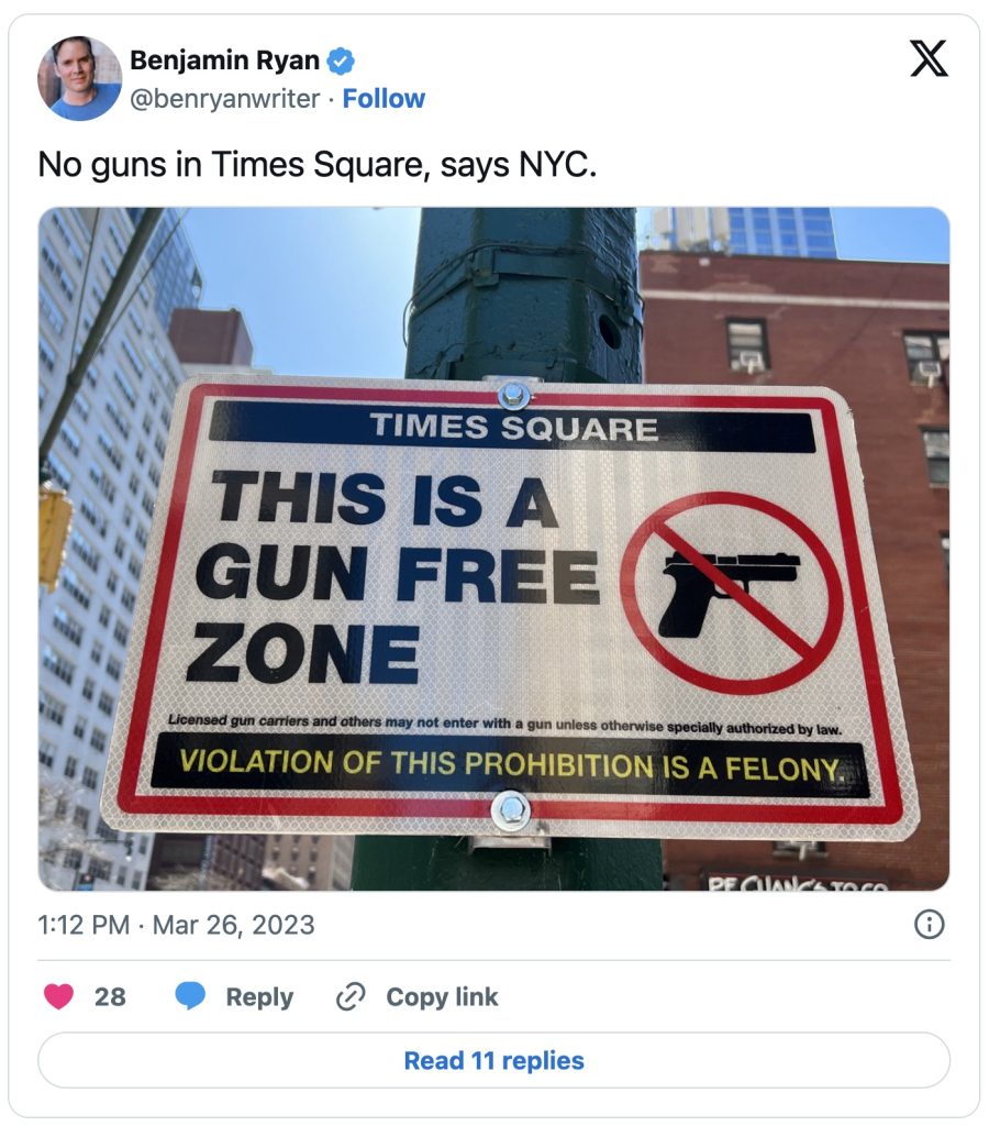 Times Square gun-free zone sign gun free