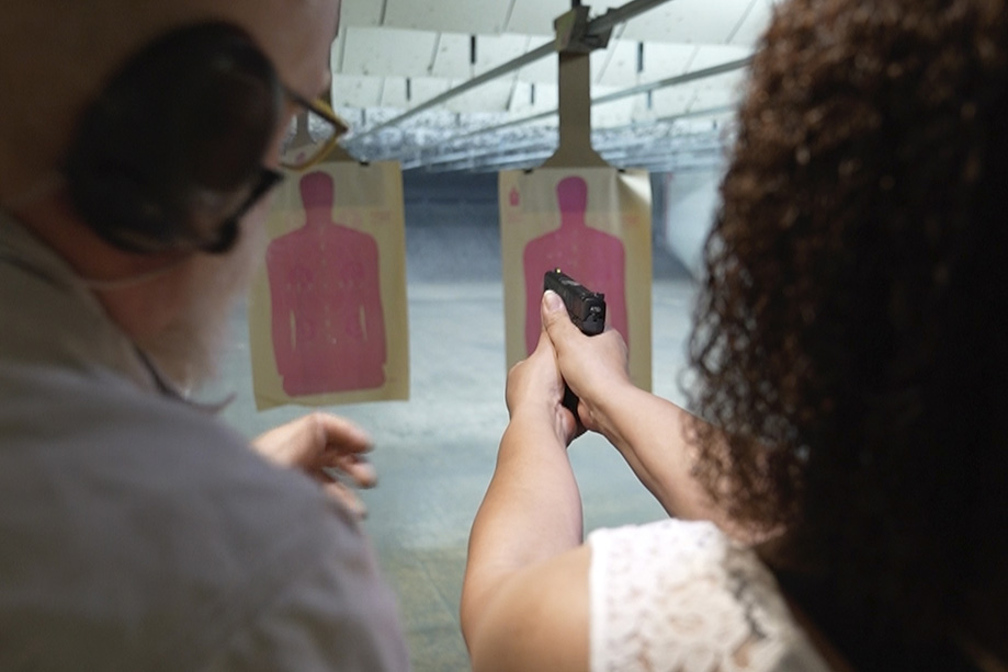 black woman women gun owner range train