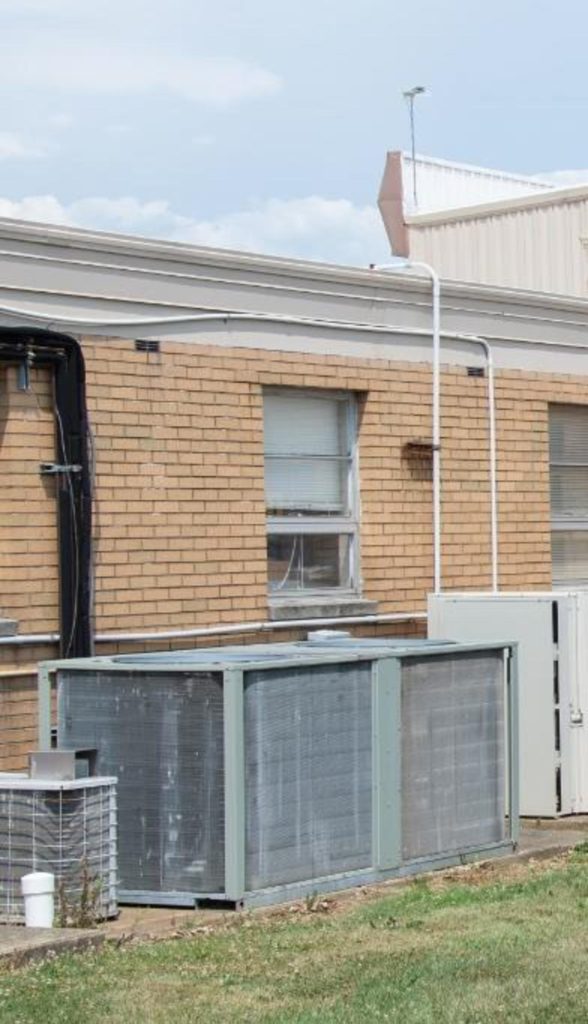 The air conditioning unit — the white box on the right — that the FBI says Thomas Crooks used to access the roof where he opened fire, as seen in a photo taken by FBI Pittsburgh and released on Wednesday, Aug. 28, 2024.