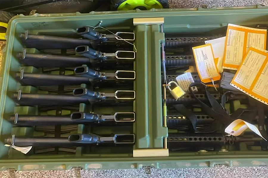 crate of guns rifles feat