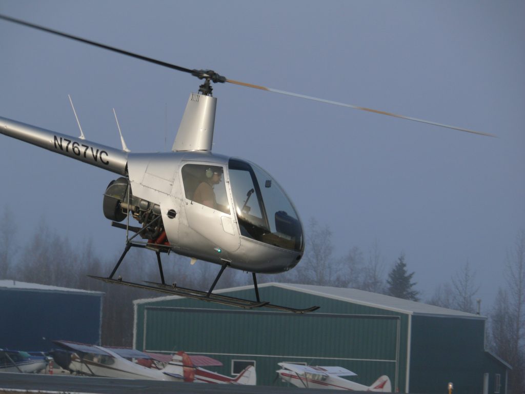 Jens "Rex Nanorum" Hammer flying an R-22 as a student