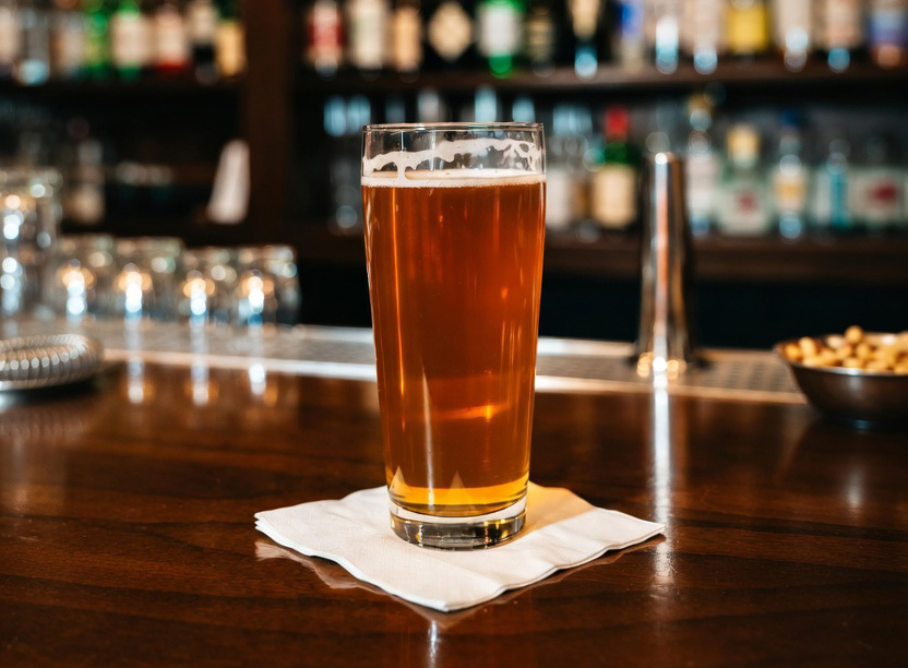 amber beer glass hotel bar grok