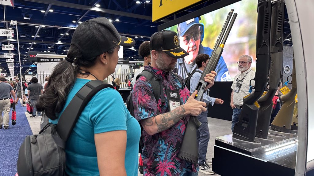Mossberg shotgun in booth at NRAAM