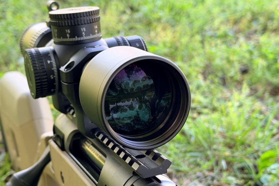 The front of a scop showing the glass lens. German Precision Optics Centuri 4x16 Compact Scope