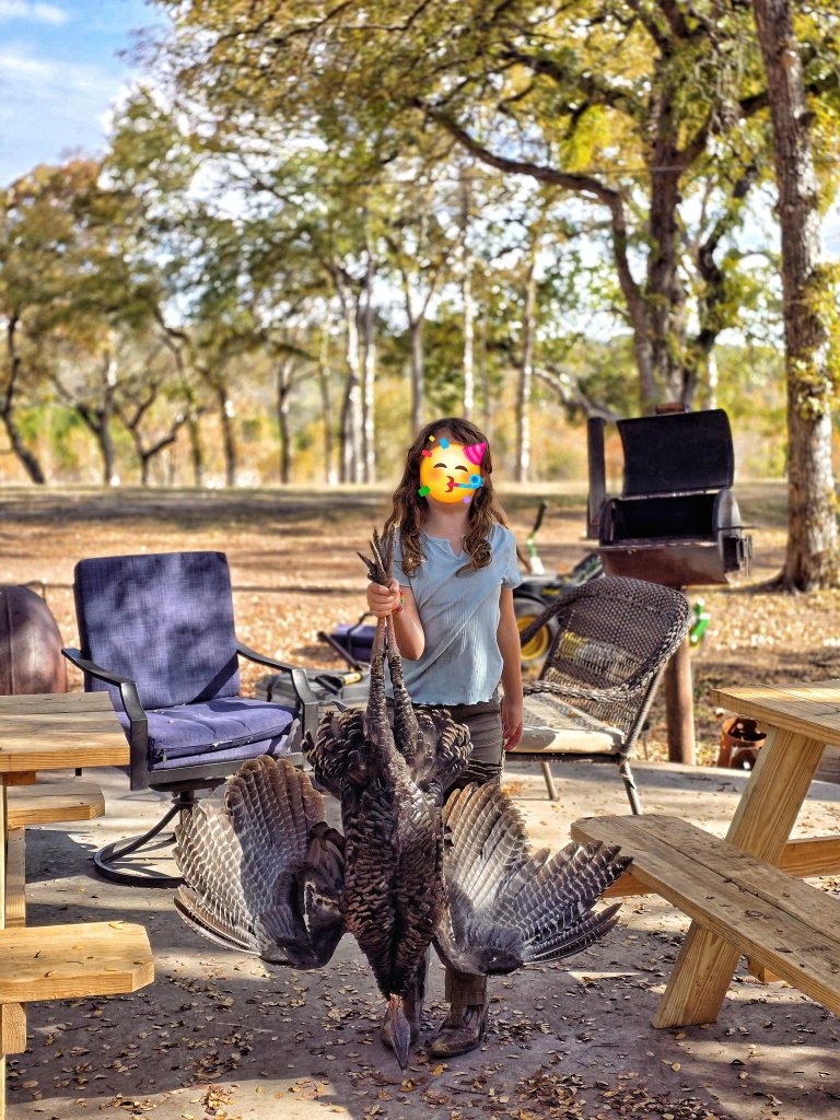 turkey hunting girl holding dead turkey