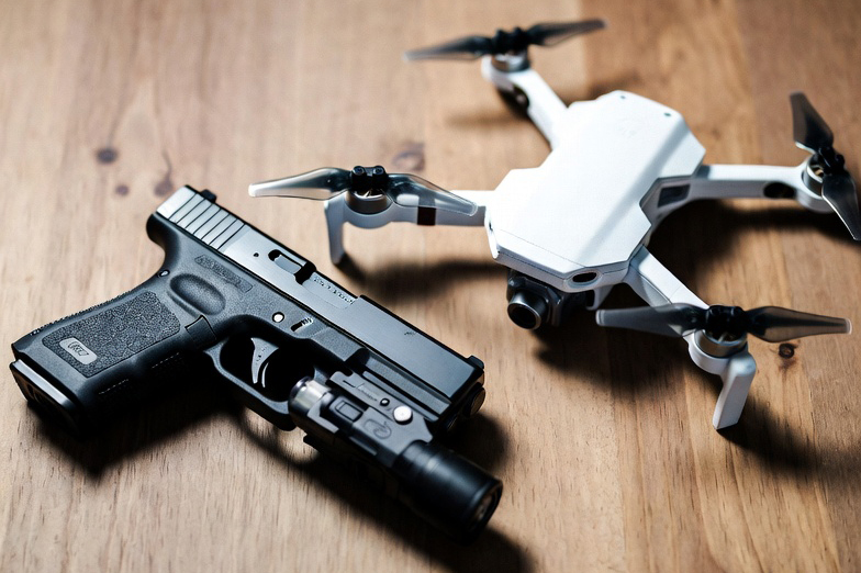 GLOCK 17 pistol and drone Grok