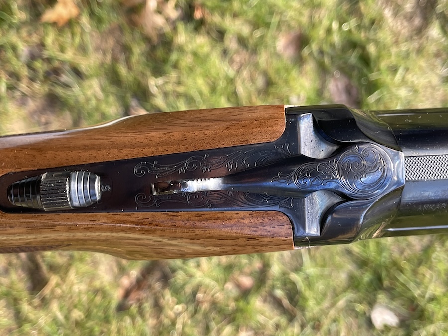 Tang safety engraving Akkar shotgun