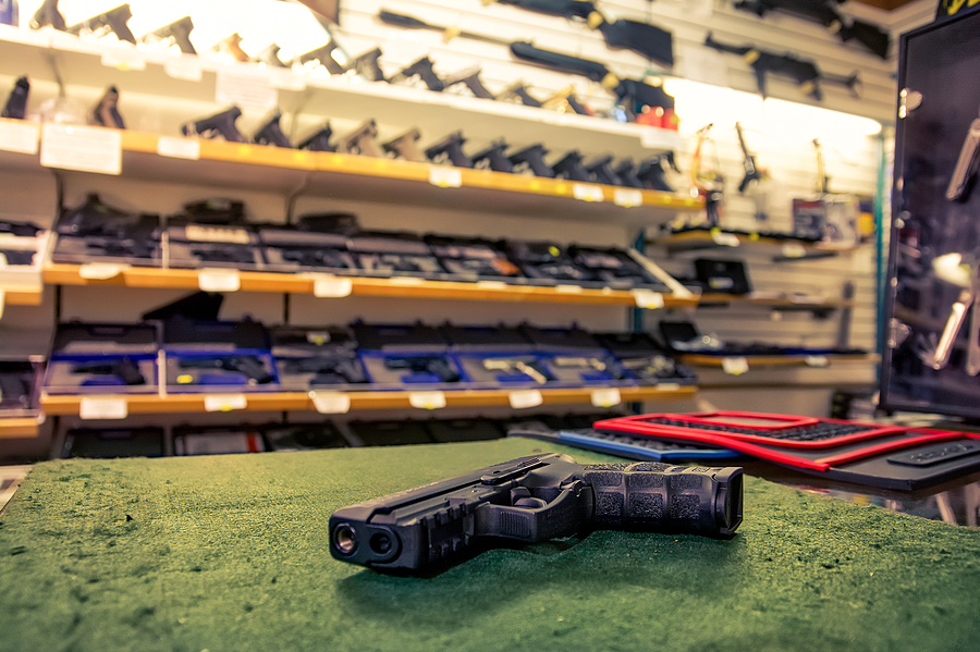 gun store counter pistol Bigstock