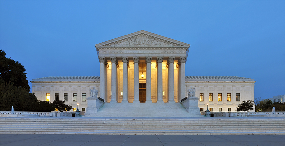 Supreme Court Building at dusk Wikimedia Commons