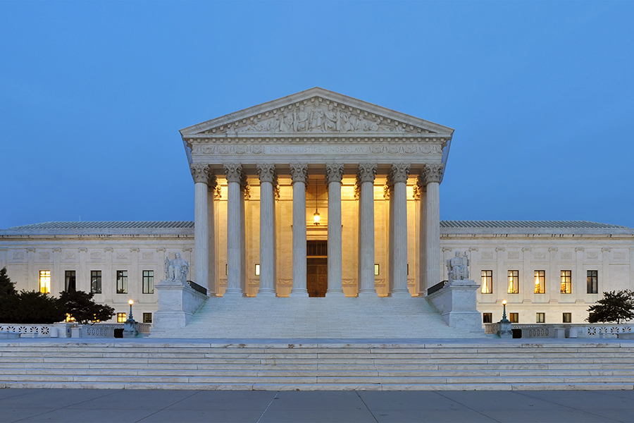 Supreme Court Building at dusk Wikimedia Commons