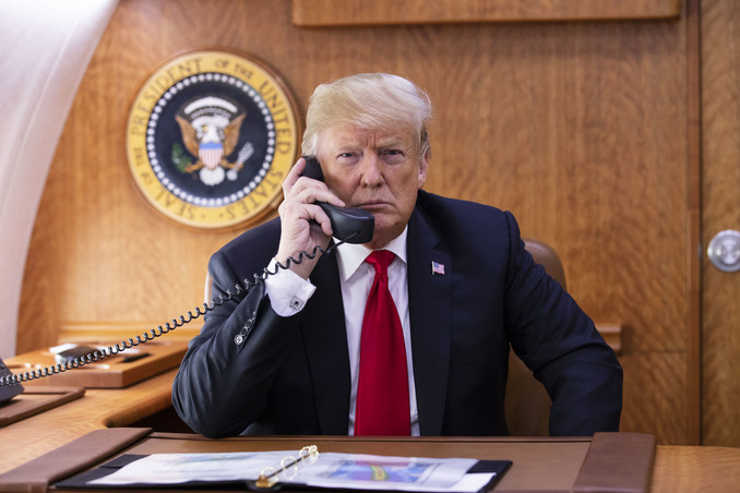 President Trump talking on the phone Air Force 1 Wikimedia Commons