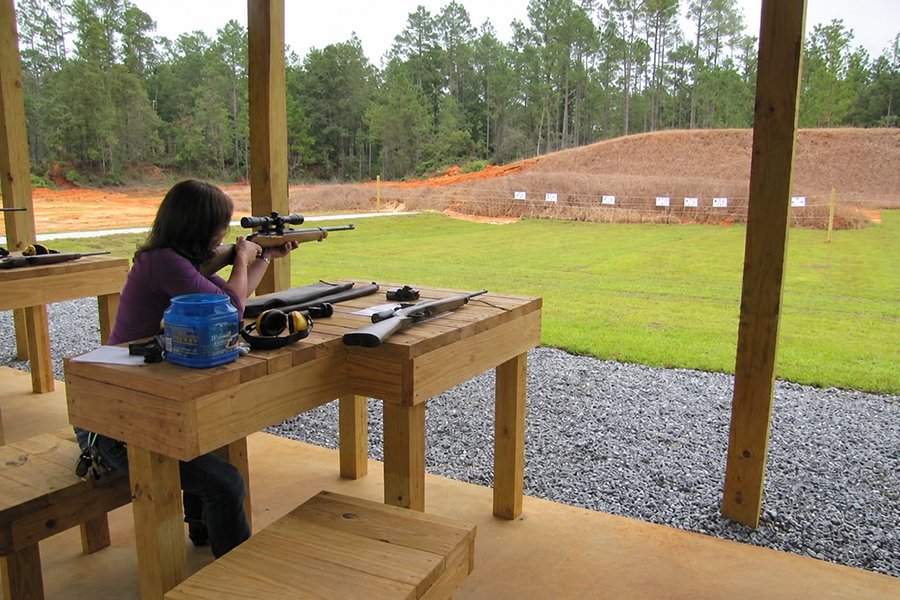 woman shooting range rifle